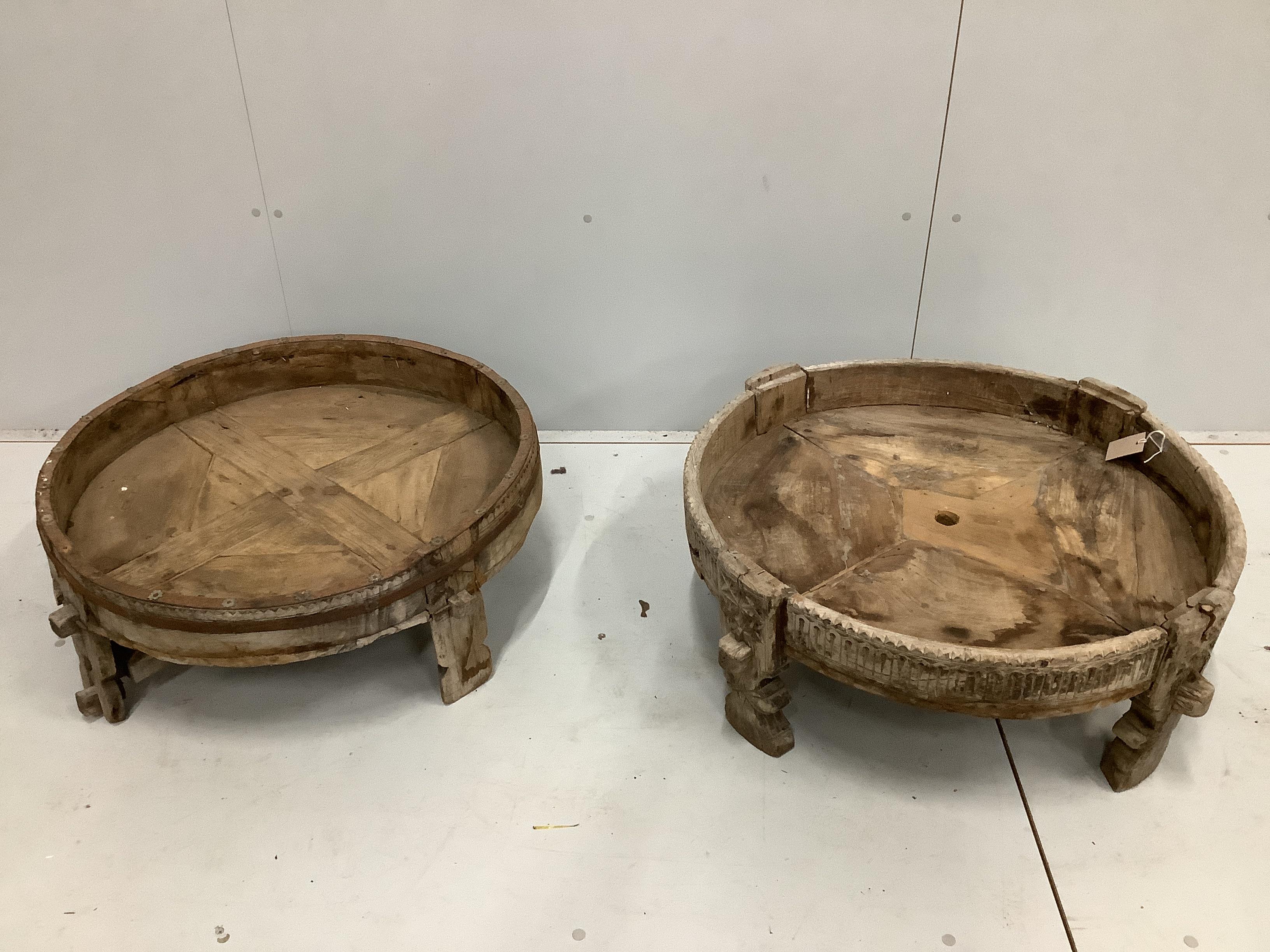Two Indian circular hardwood Chakki tables, larger diameter 77cm, height 30cm